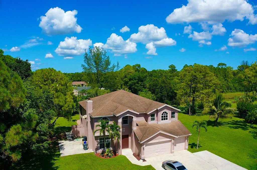 Photo of 14681 80th Lane N, Loxahatchee, FL 33470 (MLS # R10921588)