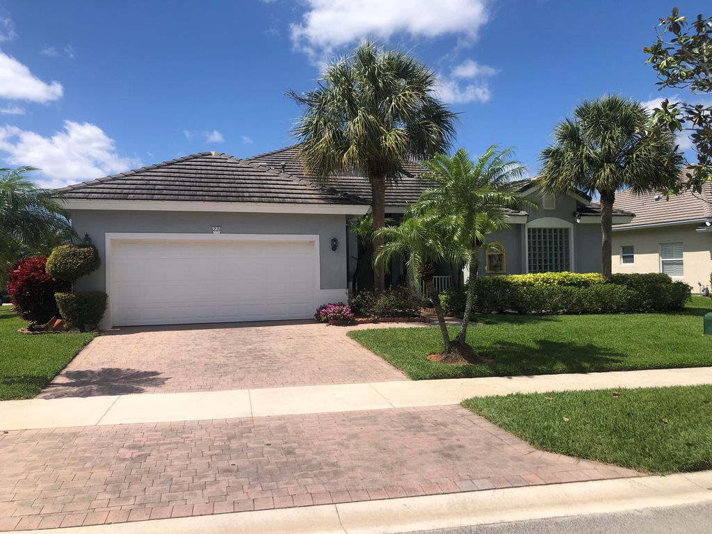 Photo of 221 NW Pleasant Grove Way, Port Saint Lucie, FL 34986 (MLS # R10774712)