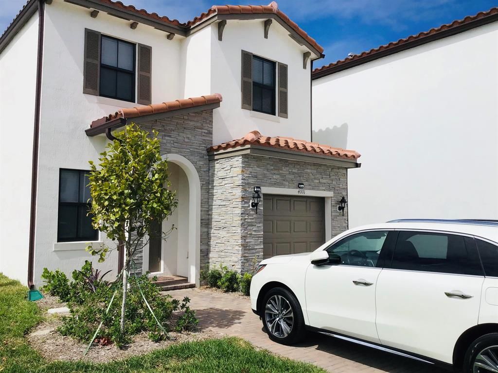 Photo of 4001 Sequoia Place, Riviera Beach, FL 33410 (MLS # R10695951)