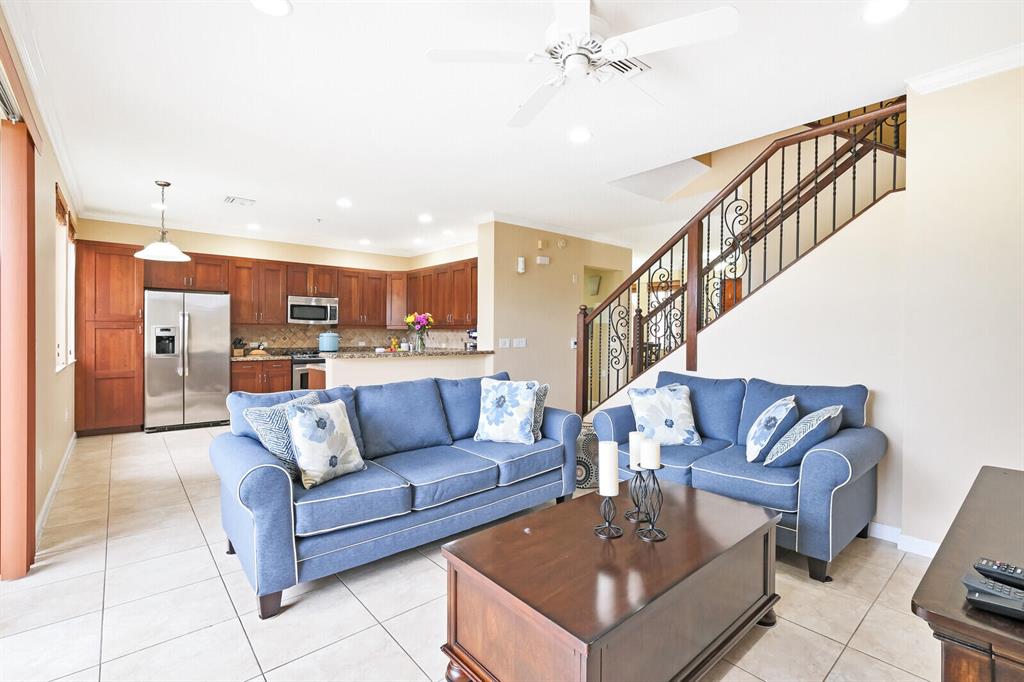 Amazing LOW-RISE, Mediterranean, townhouse-style condo in the highly-coveted Artesia neighborhood. Enjoy the tranquil setting with sidewalks and mature trees. Close to the plentiful Sawgrass shopping, the BB&T arena, and every major highway in South Florida! The area is walkable as well as a commuter's dream. Take the elevators or the stairs to this spacious unit on the 3rd floor. Continue through the unit's private entry gate and relish the features such as vaulted ceilings, open living spaces, and the extended balcony. Travel upstairs to enjoy three large bedrooms. Second floor laundry. Two bathrooms upstairs and a half bathroom downstairs. Artesia homes are going fast--Do not miss the opportunity to live in this wonderful, safe community!