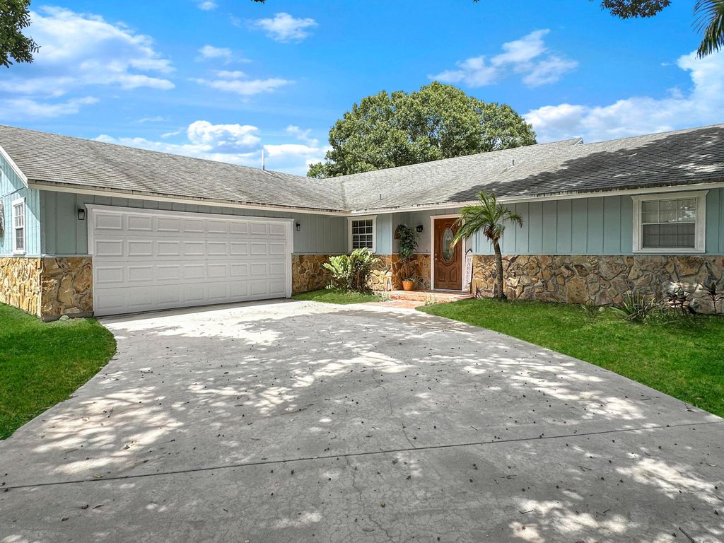 Photo of 4900 Paleo Pines Circle, Fort Pierce, FL 34951 (MLS # R11017899)