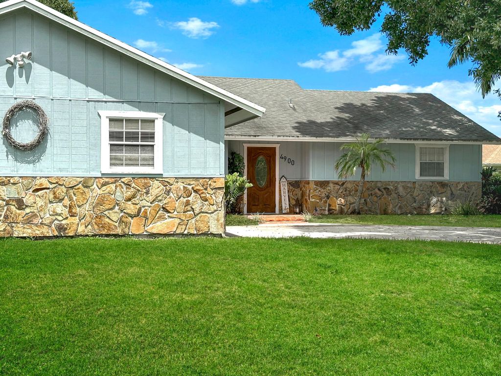 Photo of 4900 Paleo Pines Circle, Fort Pierce, FL 34951 (MLS # R11017899)