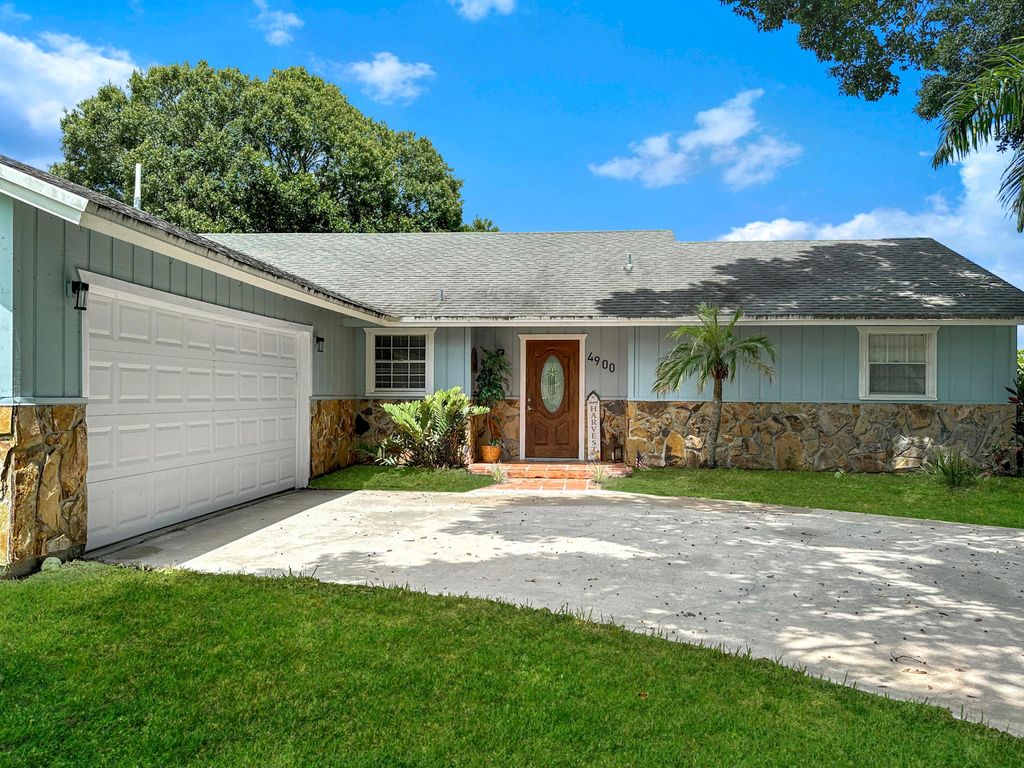 Photo of 4900 Paleo Pines Circle, Fort Pierce, FL 34951 (MLS # R11017899)
