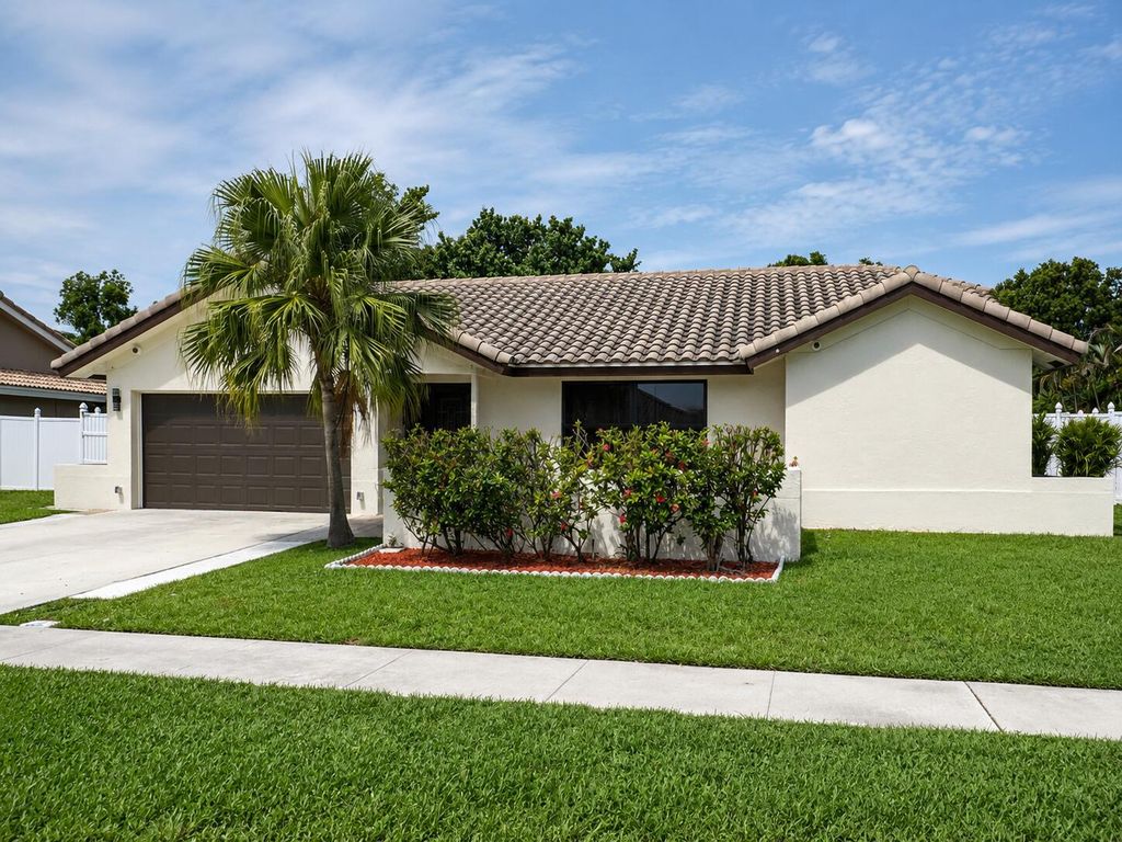 Photo of 6995 NW 5TH Avenue, Boca Raton, FL 33487 (MLS # B26052977)