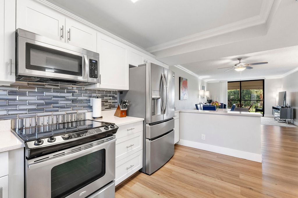 Photo of 2430 Deer Creek Country Club Blvd #307-2, Deerfield Beach, FL 33442 (MLS # B26000228)