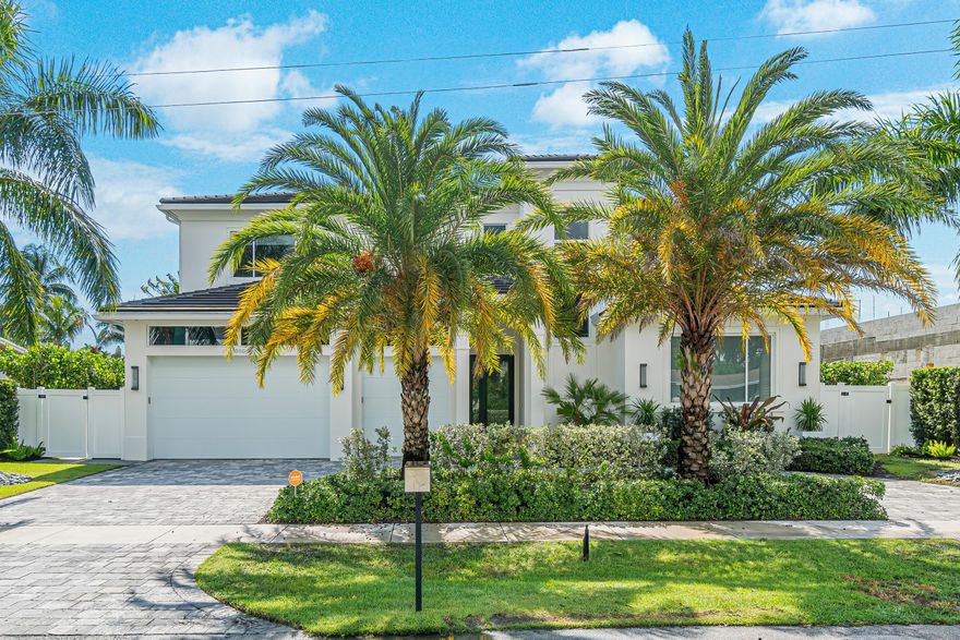 No need to wait for new construction, this contemporary home has it all! Built by Alpha Premium Development.