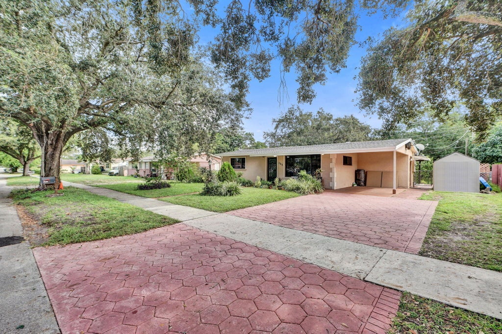 Photo of 2610 NW 74TH Avenue, Hollywood, FL 33024 (MLS # B26090161)