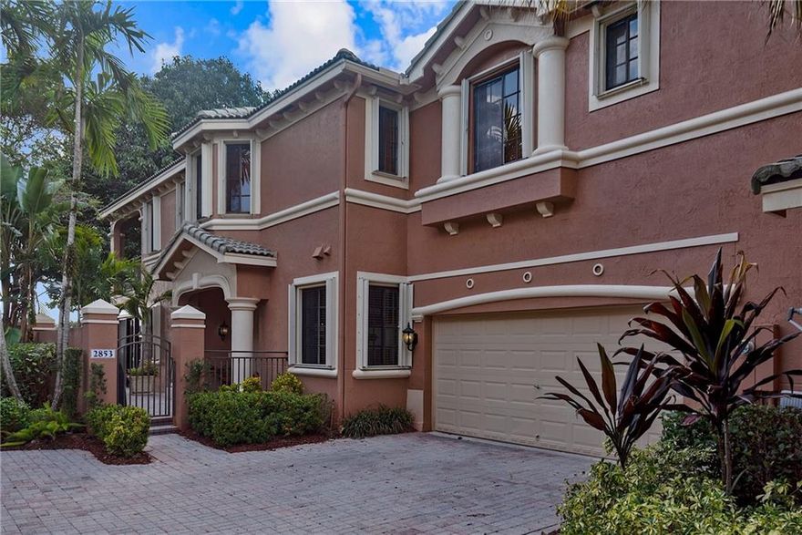 GORGEOUS COACH HOME  IN WESTON HILLS COUNTRY CLUB - LEGENDS.  HARD WOOD FLOORS THROUGHOUT, KITCHEN WITH TOP OF THE LINE APPLIANCES, BATHROOMS AND CUSTOM CLOSETS RECENTLY RENOVATED . ENCLOSED COVERED PATIO WITH ALL IMPACT GLASS WINDOWS CAN BE USED AS DEN OR OFFICE. ACCORDION SHUTTERS THROUGHOUT. LAUNDRY ROOM WITH PLENTY OF STORAGE LEADS TO THE 2 CAR ATTACHED GARAGE. STUNNING VIEW OF LAKE AND GOLF, GATED COMMUNITY WITH EASY ACCESS TO I-75 AND 595. A+ SCHOOLS AND WONDERFUL PARKS. DON’T MISS OUT ON THIS MOVE IN READY HOME!