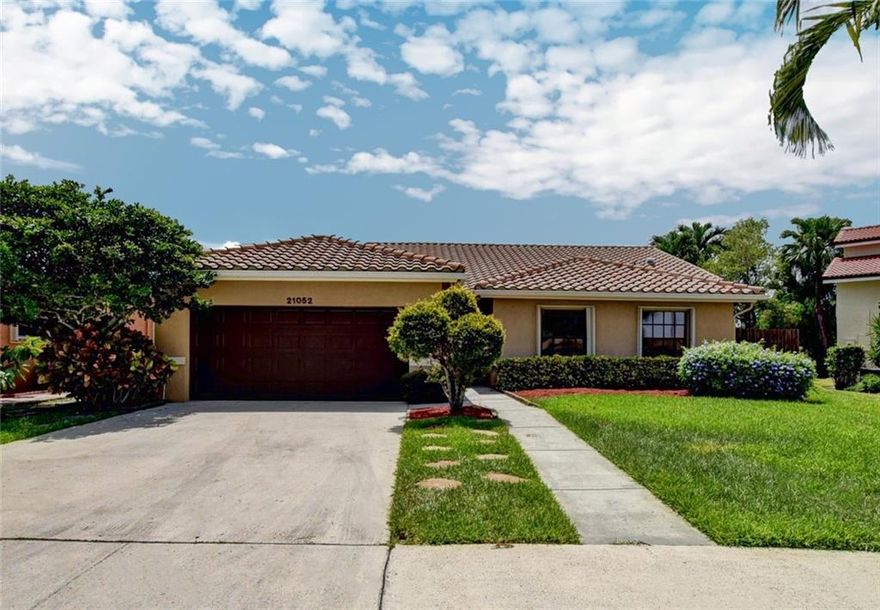 Meticulously well kept and upgraded 4 bedroom / 2.5 bathroom single family home located in Escondido near great schools and shops. This gorgeous home features an open and spacious floorplan with plenty of natural light, tall vaulted ceilings through-out, two large walk-in closets in the master bedroom, over-sized kitchen with granite countertops, separate dining area, 2-zone air conditioning. Newer roof, travertine pavers for the extended patio, updated kitchen, floors, and bathrooms. The home is ready to move in and is excellent for entertaining. The owner will provide routine lawn and landscaping services as well as pay association dues.