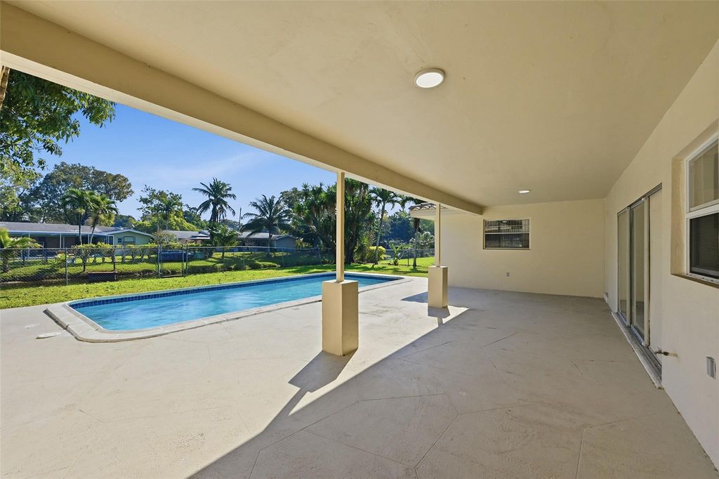 Photo of 1430 NW 73 Avenue, Plantation, FL 33313 (MLS # F10555900)