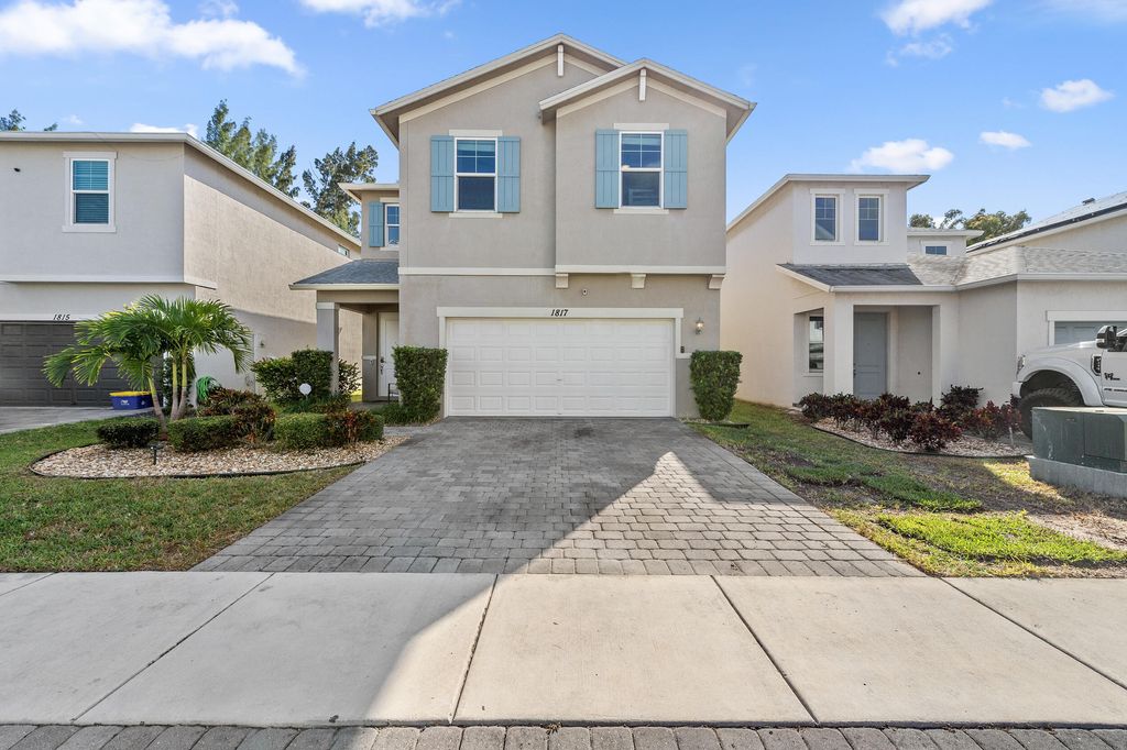Photo of 1817 Lake Cove Drive, Lake Worth, FL 33460 (MLS # B26030274)