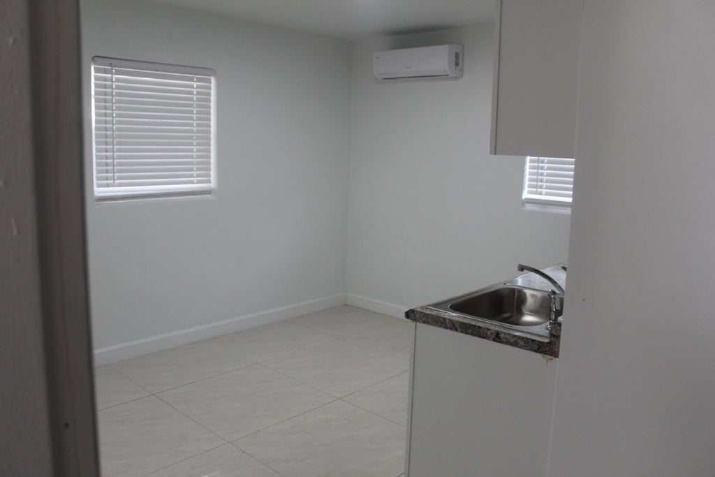 Photo of 4434 VENUS Avenue #c, West Palm Beach, FL 33406 (MLS # B26065192)