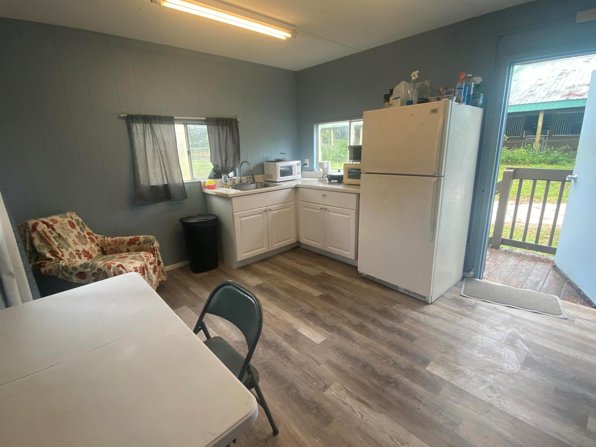 Equestrian delight! Seasonal/Annual furnished 1-bedroom apt. Live w/your horse on 14 Ac farm on B Rd in Lox. Groves minutes from PBIEC/WEF!  (Options for partial board/dry stalls). Features: Newly constructed cover over 20mx40m GGT footing warm-up arena + separate XLg all-purpose arena w/non-flooding bouncy screening sand/clay w/flat grass footing+trails & shaded paddocks. Furnished, full bath, queen thermopedic bed, kitchenette w/refrigerator, convection & toaster oven. +$50/mo for electric,. Water/shared use of laundry included. Hotspot recommended for Wifi. Private gate to enter farm, park by entrance. No smoking on premises. An animal sanctuary-no guests allowed. Small pet considered on case-by-case basis. No cats due to allergies. Harmonize w/your horse. Owner is an animal psychic.