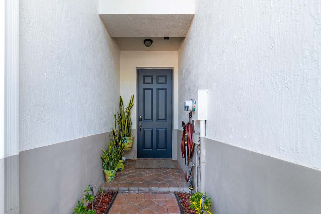 Photo of 128 W Prive Circle, Delray Beach, FL 33445 (MLS # B26066610)