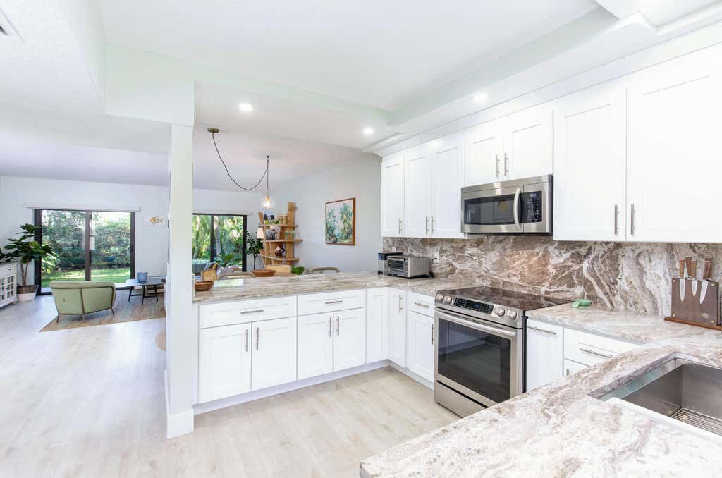 Photo of 11267 Pond View B102 Drive #B102, Wellington, FL 33414 (MLS # B26068493)