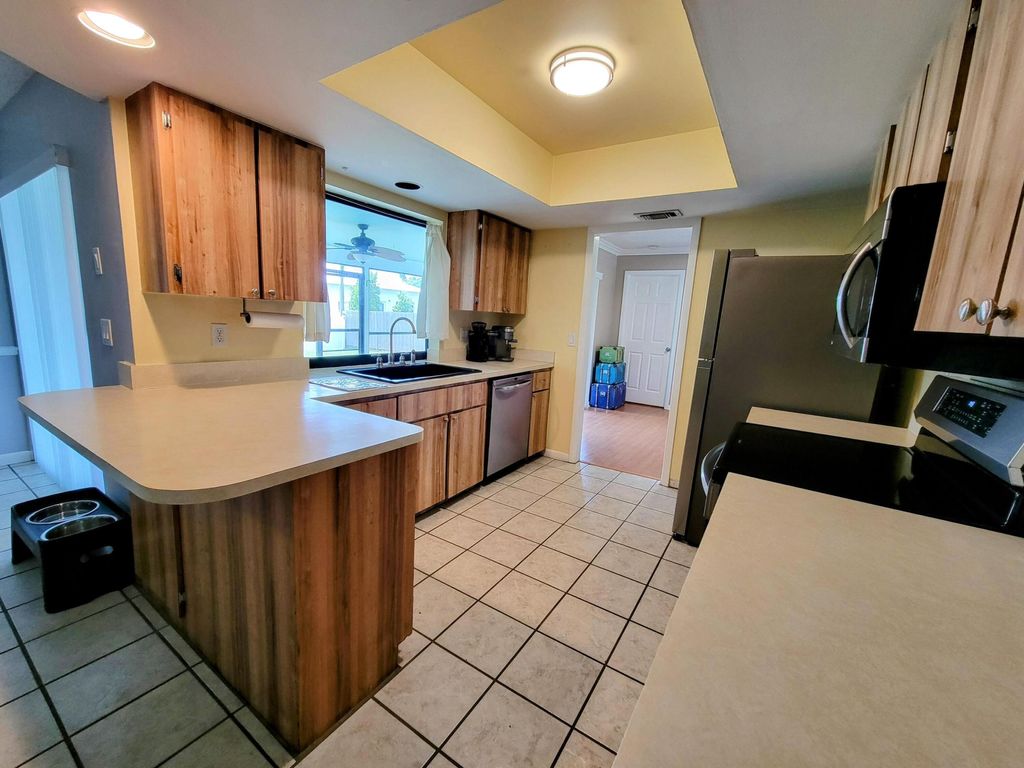 Photo of 102 SW Fairchild Avenue, Port Saint Lucie, FL 34984 (MLS # R11011885)