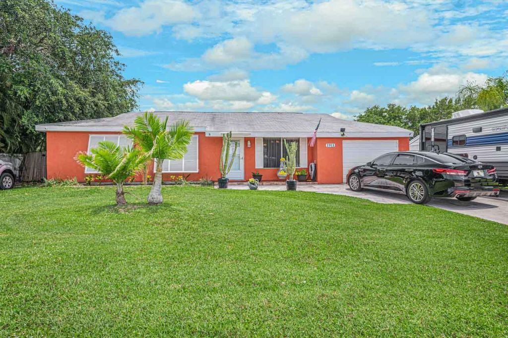 Photo of 1911 SE Oxmoor Terrace, Port St Lucie, FL 34952 (MLS # R10894106)