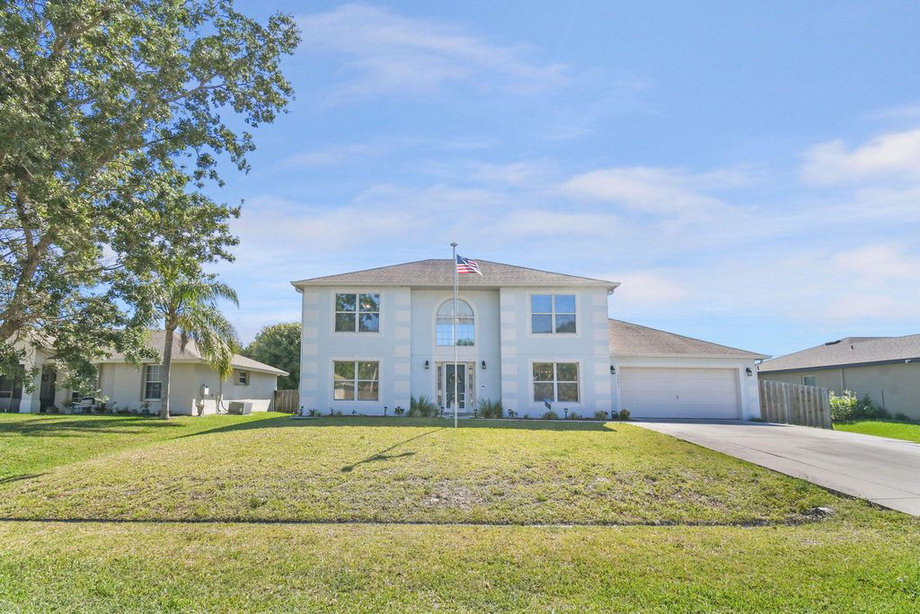 Photo of 3981 SW Alice Street, Port Saint Lucie, FL 34953 (MLS # R10976017)