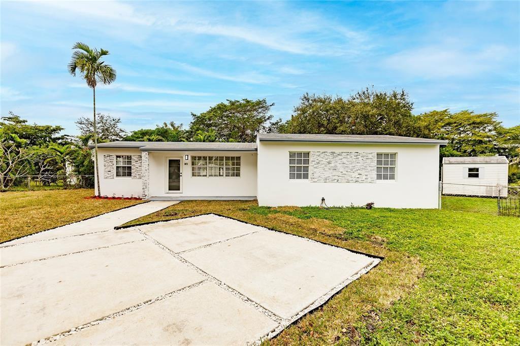 Remodeled 4 bedroom/2 bath Miami Home in East Hialeah close to Wynwood & Midtown, Permitted roof 2016, Updated Kitchen with 36" White and Grey Wood Cabinets with Calacatta Quartz countertops & subway tiled backsplash, Island with front decorative vinyl panel & 1/2 right side waterfall, Central A/C, Tankless Water Heater, Stacked Washer & Dry, & New Black Samsung Stainless Steel Appliances. 32” Calaccatta tiles throughout, New baseboards, trim, outlets, switches, hardware & Updated Bathrooms. Offering a nice big Concrete driveway & walkway with big front and back yard perfect for entertaining family and friend or gatherings. Located just minutes away from Airport and close to Hialeah hospital.