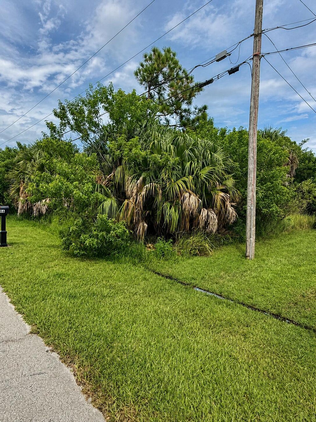 Photo of 2185 SW IMPERIAL Street, Port Saint Lucie, FL 34987 (MLS # B26072179)
