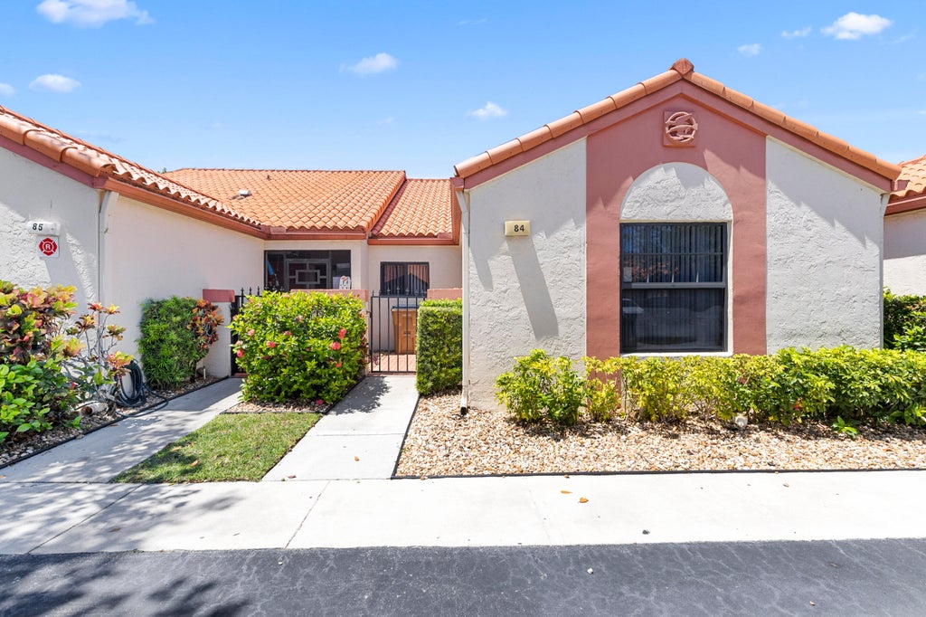 Photo of 84 CENTENNIAL Court, Deerfield Beach, FL 33442 (MLS # B26070704)