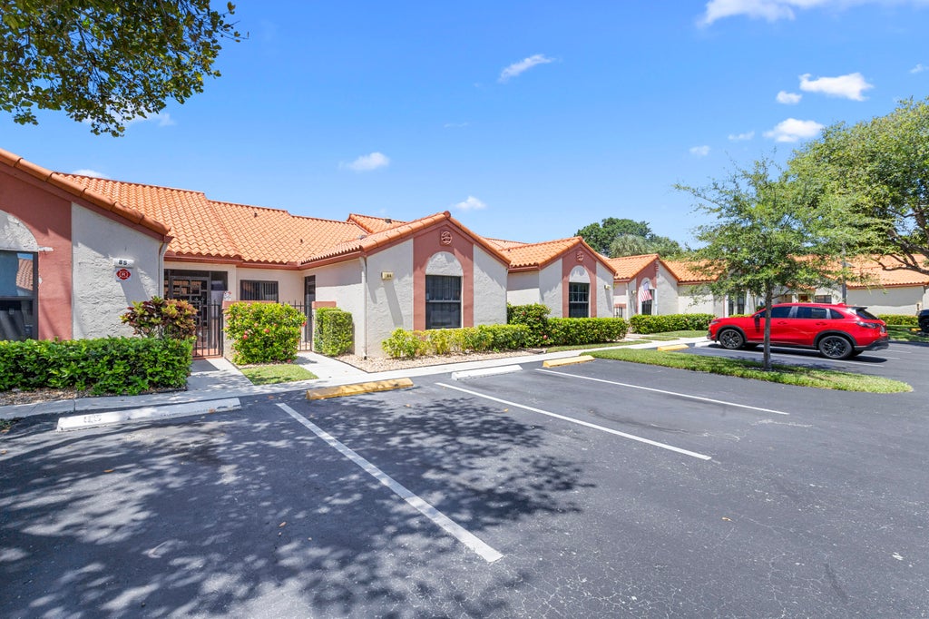Photo of 84 CENTENNIAL Court, Deerfield Beach, FL 33442 (MLS # B26070704)