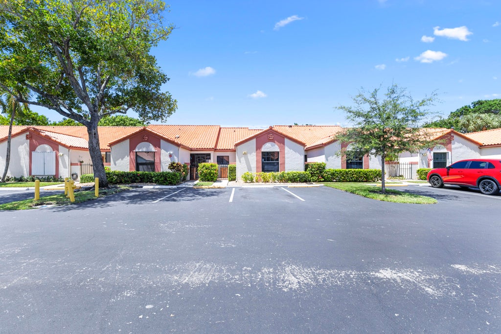 Photo of 84 CENTENNIAL Court, Deerfield Beach, FL 33442 (MLS # B26070704)