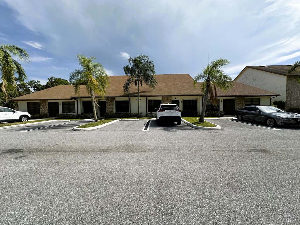 Photo of 1040 PARKSIDE GREEN Drive #C, Greenacres, FL 33415 (MLS # B26068118)