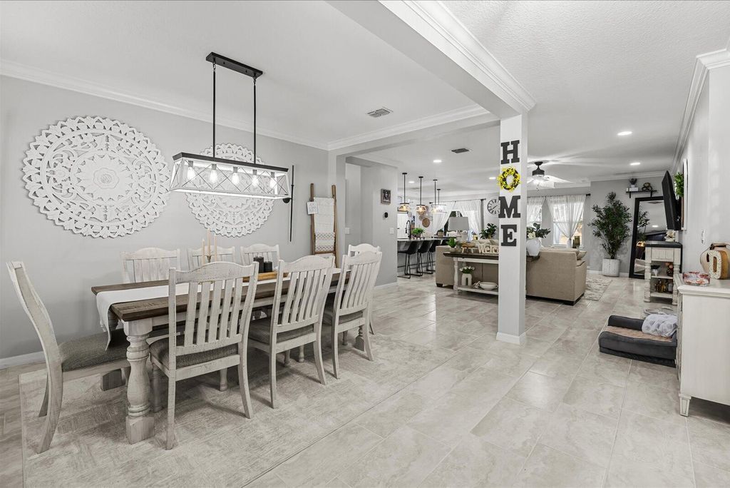 Photo of 2064 SW Monterrey Lane, Port Saint Lucie, FL 34953 (MLS # B26010472)