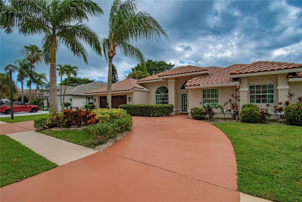 Photo of 10400 Milburn Lane, Boca Raton, FL 33498 (MLS # F10529244)
