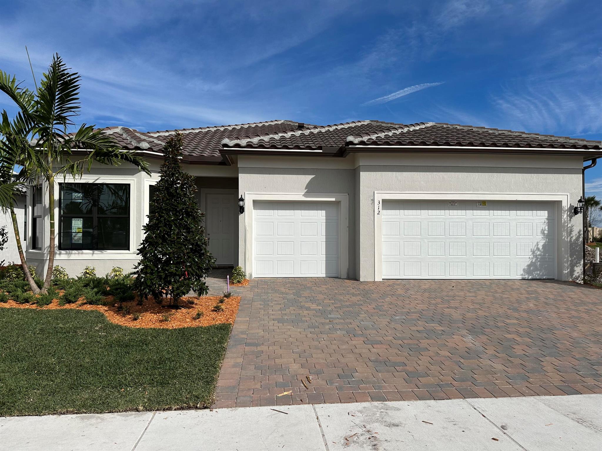 Welcome to your dream home! This exquisite 3-bed, 2.5-bath residence is situated on a unique Cul-de-sac street. Inside boasts luxurious features including pocket sliders that open to an expansive lanai, inviting the outdoors in for seamless entertaining and relaxation. The owner's suite impresses with its spacious walk-in closet, offering ample storage. Marvel at the voluminous 10'8 ceilings that enhance the home's airy ambiance. The gourmet kitchen, equipped with high-end gas appliances, is a chef's delight, providing the perfect space for culinary creations and gatherings. With its blend of modern amenities and elegant design, this home epitomizes comfort and sophistication. Move In this Summer and take Advantage of Special Builder Incentives Available!