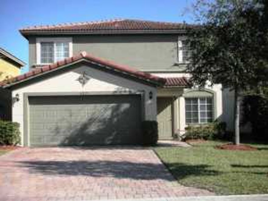 Immaculate lakefront 2 story house in great neighborhood.  Shows like new w stainless steel appliances and granite in open kitchen.  Lge neutral tile on first level and gorgeous wood-like floors on 2nd fl.  Huge walk-in-closet in master.  Interior and exterior of house recently painted.  Community offers large pool and tennis courts in walking distance from house.