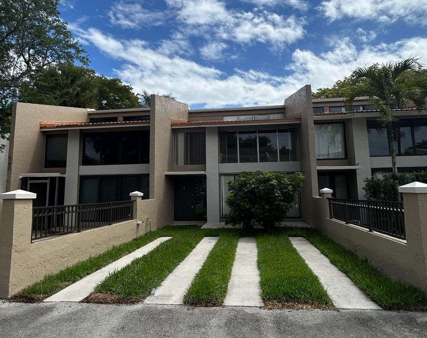 Welcome to the Majestic View community in Plantation! This two-bedroom plus loft, and 2 bathrooms, is a perfect blend of comfort and style. Step inside and be greeted by an open, airy layout bathed in natural light. The spacious living area flows seamlessly into an updated kitchen featuring stainless-steel appliances. Upstairs, the loft offers endless possibilities—use it as a home office, media room, or even a cozy reading nook. Both the primary suite and second bedroom overlook the lake. Outside, enjoy the tranquility of the neighborhood on your private patio, perfect for morning coffee or evening unwinding. Residents enjoy lush landscaping, located near Jacaranda Golf Club, shopping, dining, and major highways.