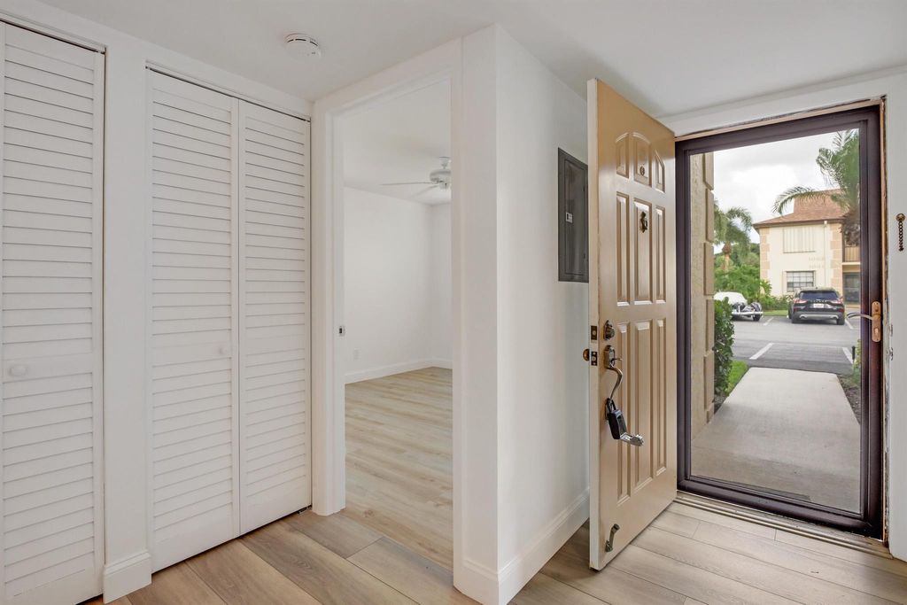 Photo of 901 Pinecrest Circle #F, Jupiter, FL 33458 (MLS # R10968245)