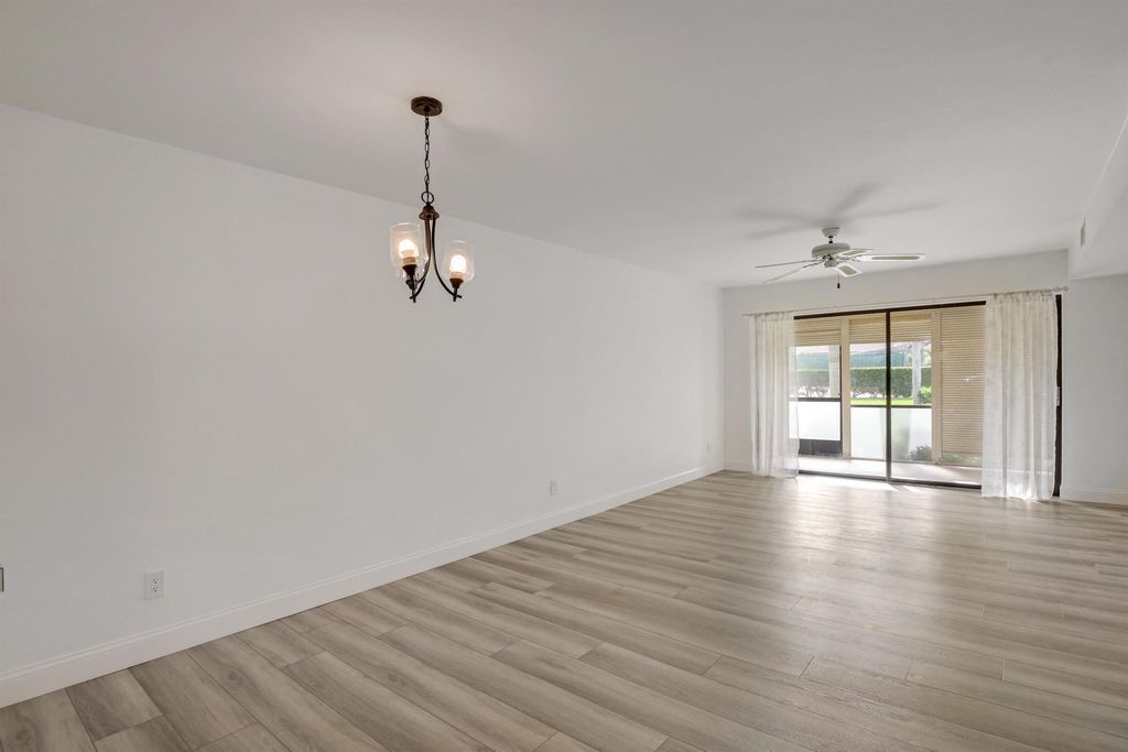 Photo of 901 Pinecrest Circle #F, Jupiter, FL 33458 (MLS # R10968245)