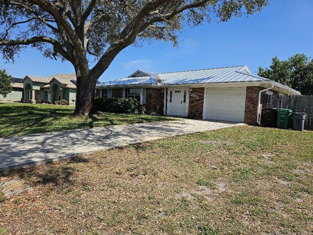 Photo of 2197 SW Venus Street, Port Saint Lucie, FL 34953 (MLS # R11067248)