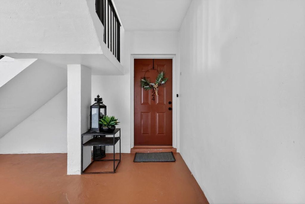 Photo of 124 Lake Evelyn Drive, West Palm Beach, FL 33411 (MLS # R11158211)