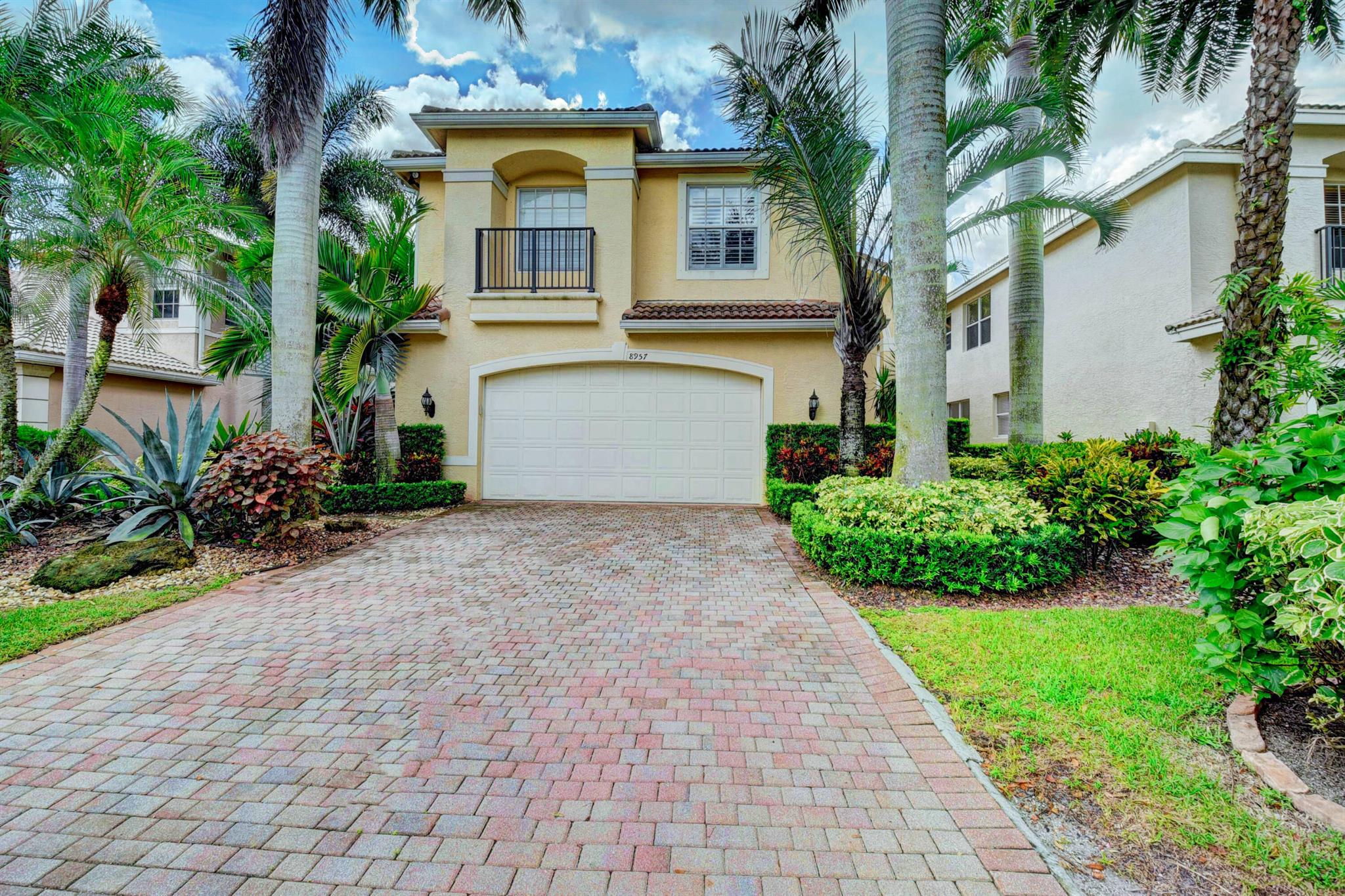 This absolutely STUNNING residence in upscale Canyon Isles shows like a model home. A MUST SEE!!! Inside you will notice all the high end upgrades such as 24'' marble floors, gourmet kitchen w/GE profile appliances, cherry cabinets, granite counters, crown molding, plantation shutters throughout, vaulted ceilings, custom wall arches, central vacuum, solid core doors, built in stereo & intercom system, upgraded bathroom vanities, recessed lighting, Jacuzzi spa tub, premier garage storage cabinets.