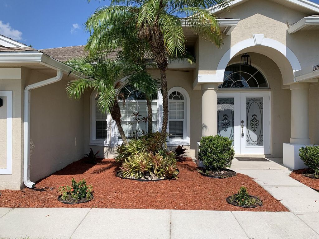 Photo of 2426 SE Whitehorse Street, Port Saint Lucie, FL 34984 (MLS # R10991634)