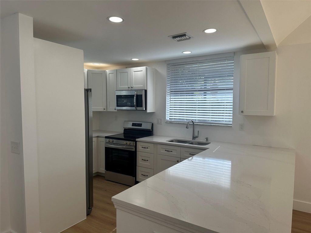 Photo of 5650 Fox Hollow Drive, Boca Raton, FL 33486 (MLS # B26021912)