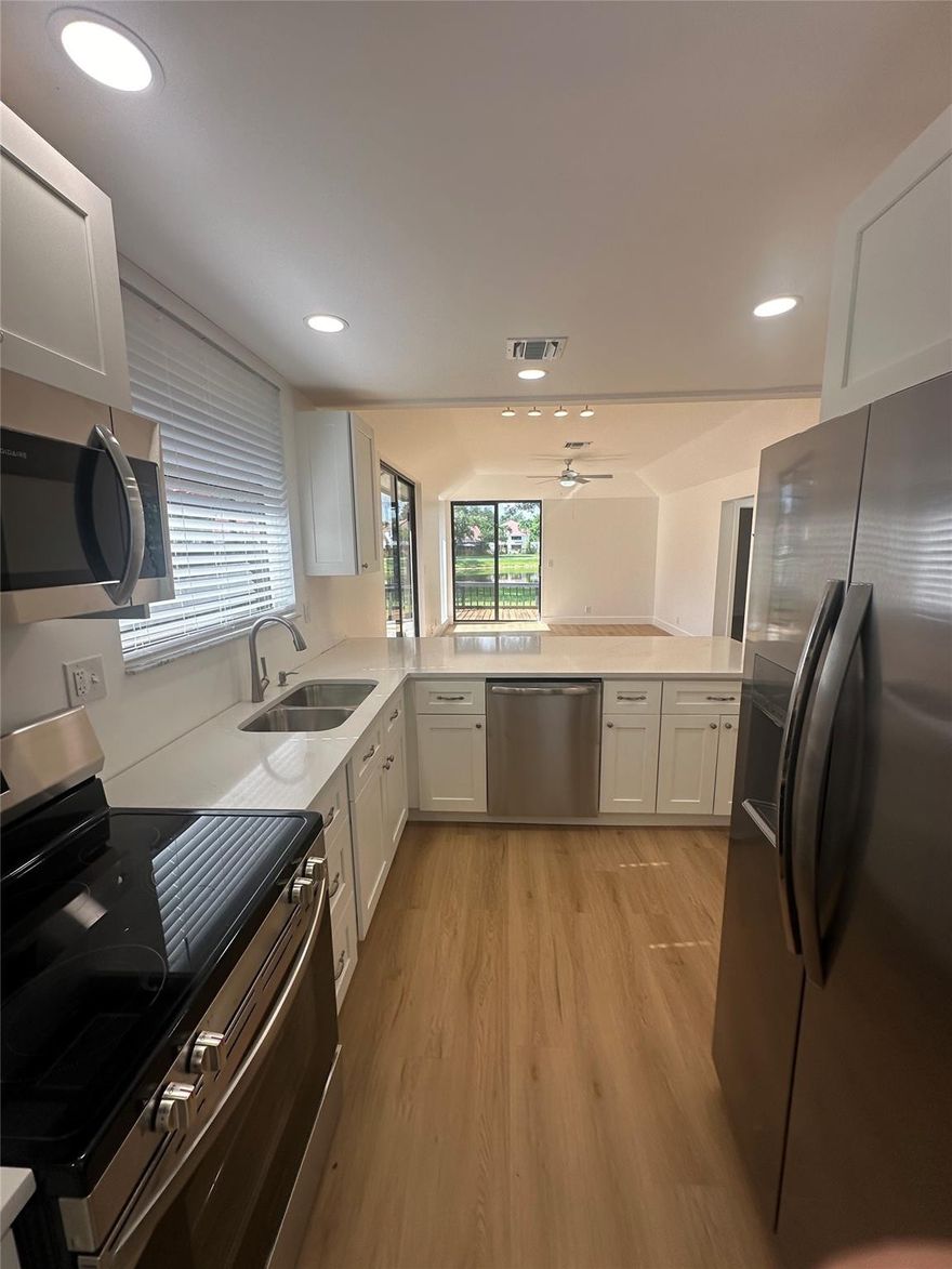 Fully remodeled 2 bed 2 bath first floor lakefront unit available in the man gated community of Town Place. This unit boasts a brand new kitchen, new appliances, new AC, new flooring, new bathrooms, fresh paint, and a massive wrap around patio with a direct view of the lake for outdoor living. Easy access to I-95, fine dining, and shops.