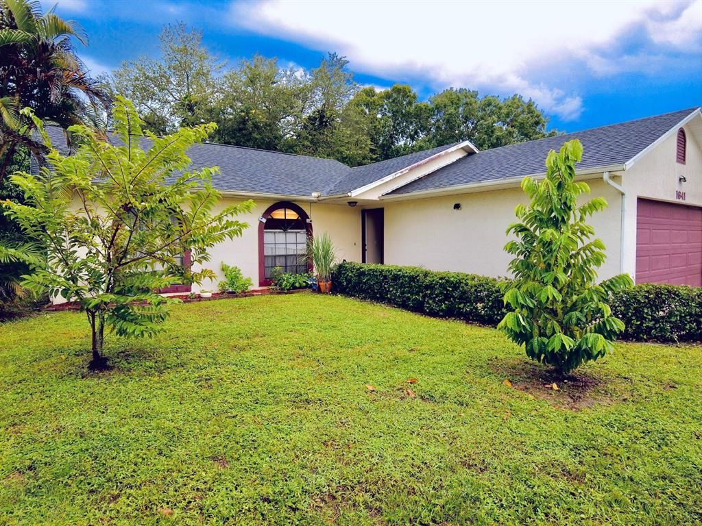 Photo of 1641 SW Import Drive, Port Saint Lucie, FL 34953 (MLS # R10752525)