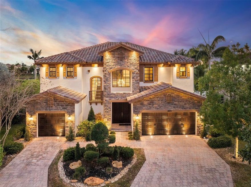 Stunning Wentworth model offering 6 bedrooms, a loft, a private office, 7 full bathrooms, and a half bath. Built in 2014, this exceptional residence is situated on an oversized waterfront lot with breathtaking views. The outdoor living space features a travertine-paver patio and a custom saltwater pool, perfect for entertaining or relaxing. Notable upgrades include a new main A/C system, hardwood flooring on the stairs and loft, a stone-accented elevation, wrought iron staircase railing, impact windows and doors, gas service, an electric fireplace, crown molding, wood-grain front and garage doors, landscape lighting, designer lighting fixtures, and an integrated speaker system. Enjoy resort-style amenities including a clubhouse, pool, fitness center, splash park, and playground