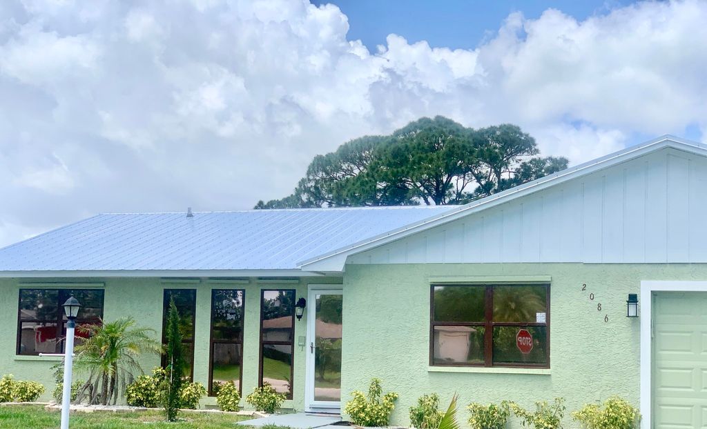 Photo of 2086 SW Gemini Lane, Port Saint Lucie, FL 34984 (MLS # R10797312)