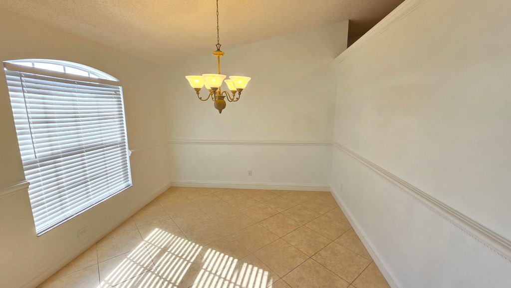 Photo of 6448 NW Colgate Street, Port Saint Lucie, FL 34986 (MLS # B26004018)