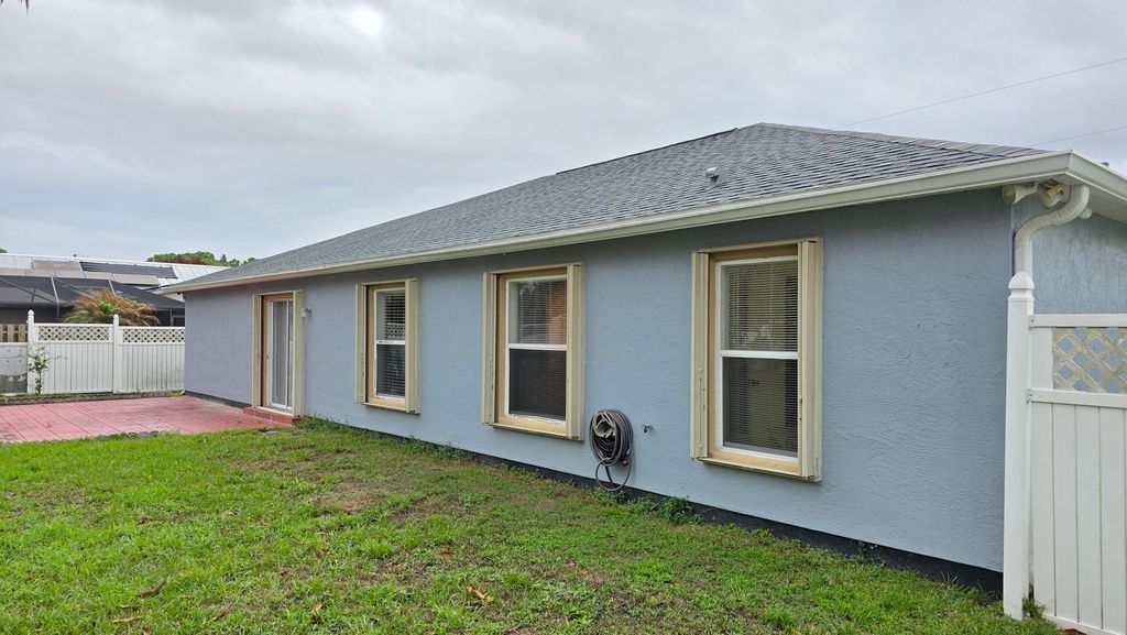 Photo of 6448 NW Colgate Street, Port Saint Lucie, FL 34986 (MLS # B26004018)