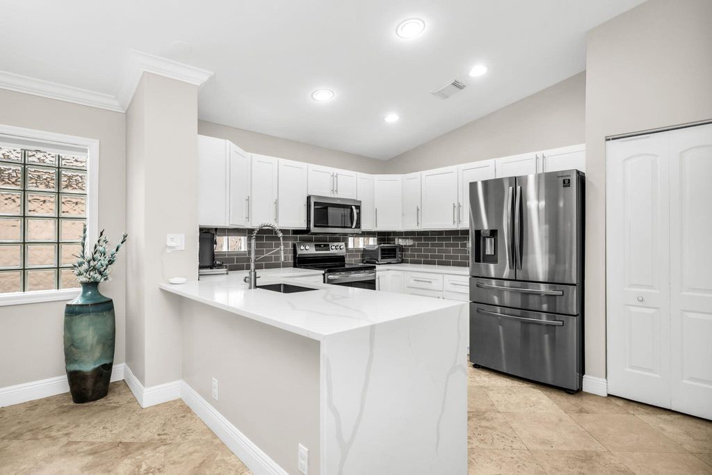 Photo of 12361 NW 55th Street, Coral Springs, FL 33076 (MLS # B26027966)