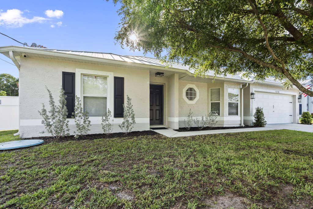 Photo of 4156 SW Belshaw Street, Port Saint Lucie, FL 34953 (MLS # B26046212)