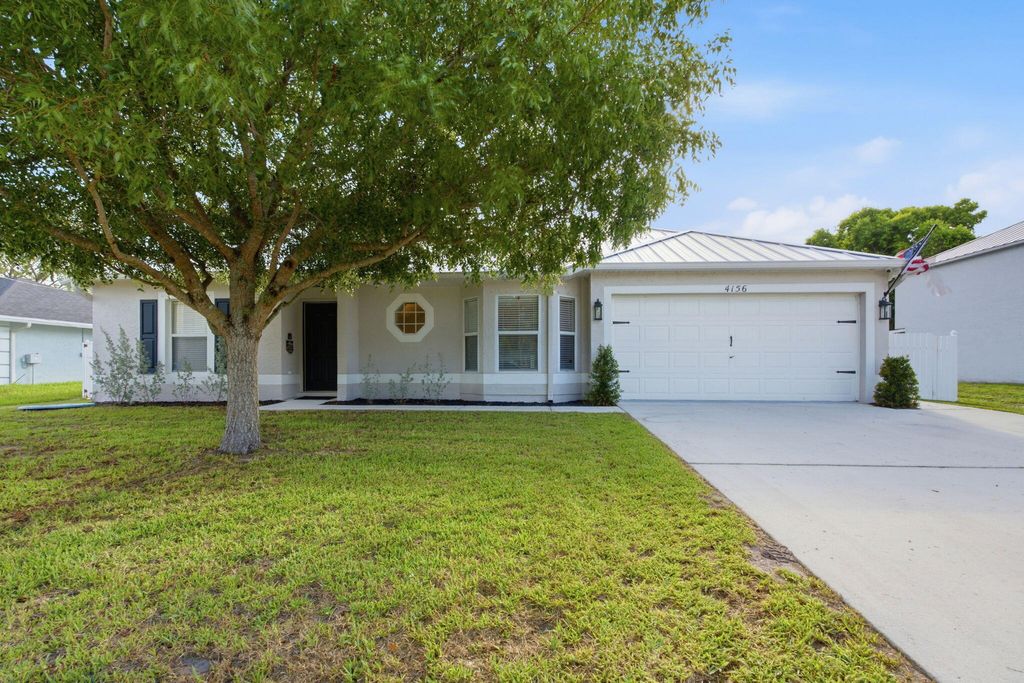 Photo of 4156 SW Belshaw Street, Port Saint Lucie, FL 34953 (MLS # B26046212)