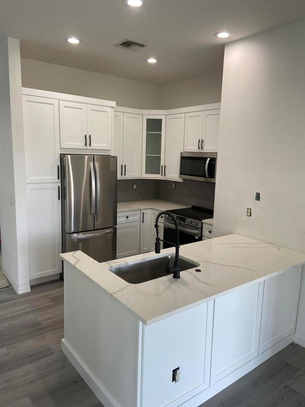 Photo of 4986 Bonsai Circle #214, Palm Beach Gardens, FL 33418 (MLS # R11022891)